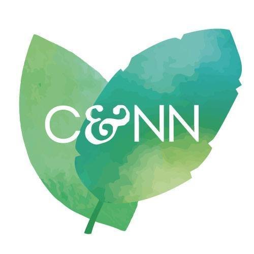 Logo for the Children & Nature Network featuring two overlapping watercolor-style leaves in green and teal with the white initials ‘C&NN’ centered on top.